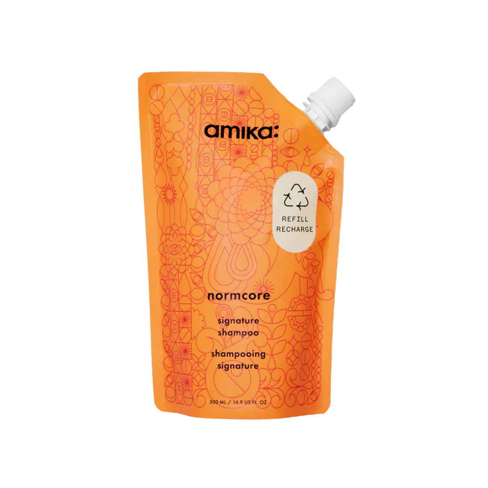 Flacon du shampoing amika Normcore pour nettoyage doux et cheveux brillants

