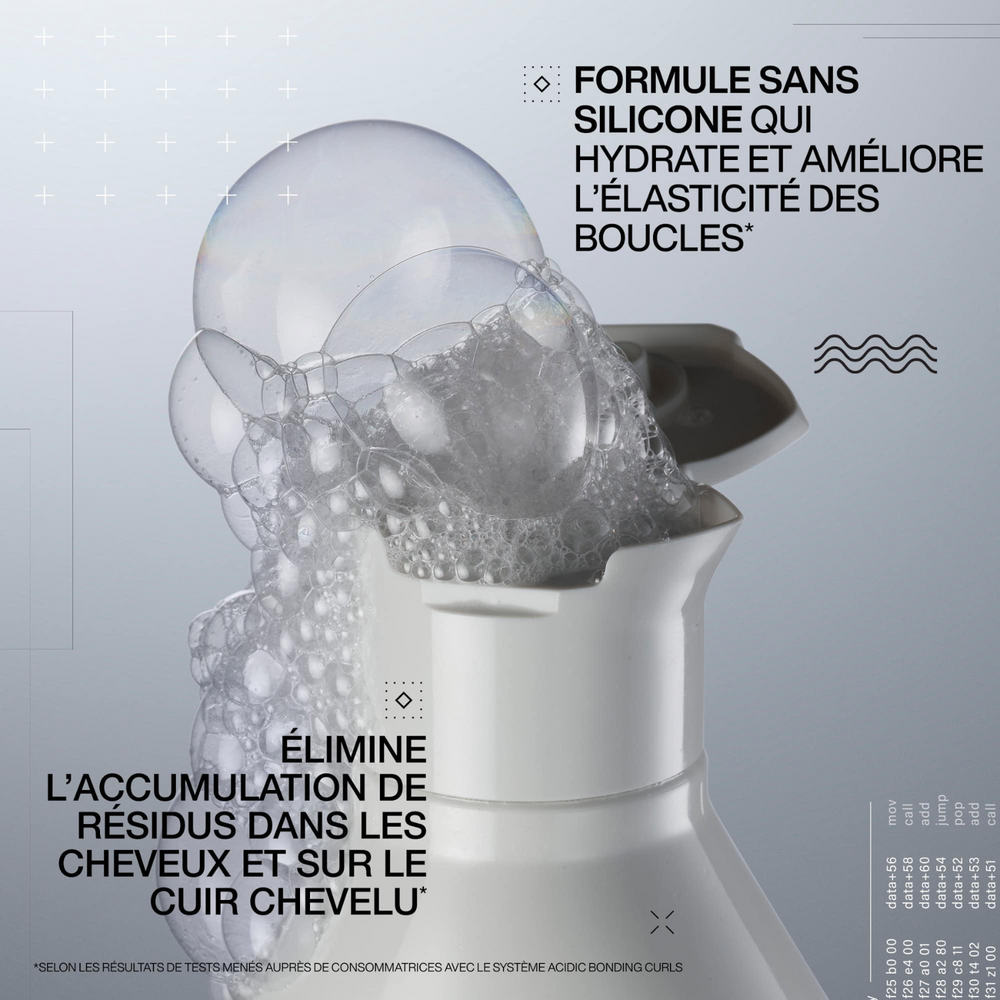 Flacon du shampooing Acidic Bonding Curls Redken pour cheveux bouclés, sans silicone.