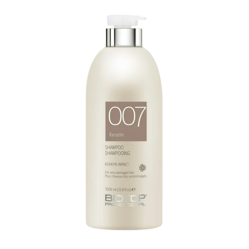 Flacon de shampooing Biotop 007 Keratin Impact 1 L, étiquette sobre et design élégant.