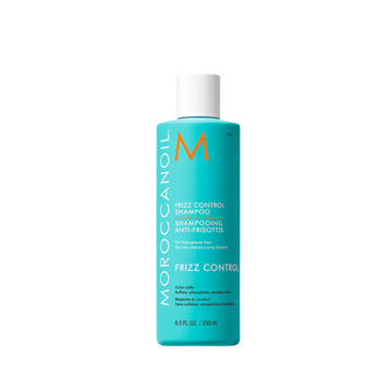 Flacon bleu Moroccanoil Frizz Control Shampoo, soin anti-frisottis 72 h

