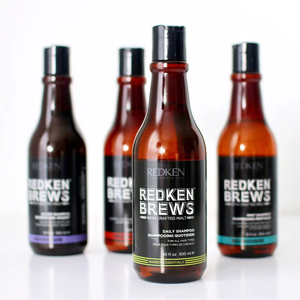 Bouteille de shampooing Redken Brews 1 000 ml avec étiquette noire, format professionnel pour usage quotidien masculin