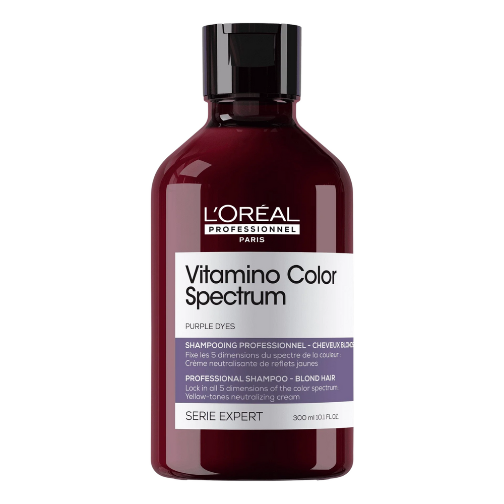 Flacon de shampooing violet Vitamino Color Spectrum L’Oréal Professionnel, idéal pour cheveux blonds.


