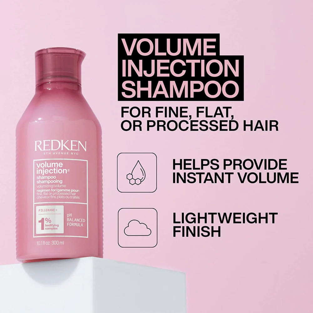 Flacon 1000 ml du shampooing Volume Injection Redken sur fond clair.
