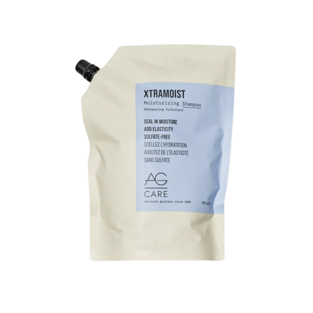 alt="Flacon de shampooing hydratant AG Care XTRAMOIST pour cheveux secs ou abîmés"