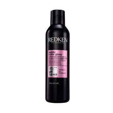 Bouteille du traitement lustrant Redken Acidic Color Gloss, luxe professionnel et couleur protégée