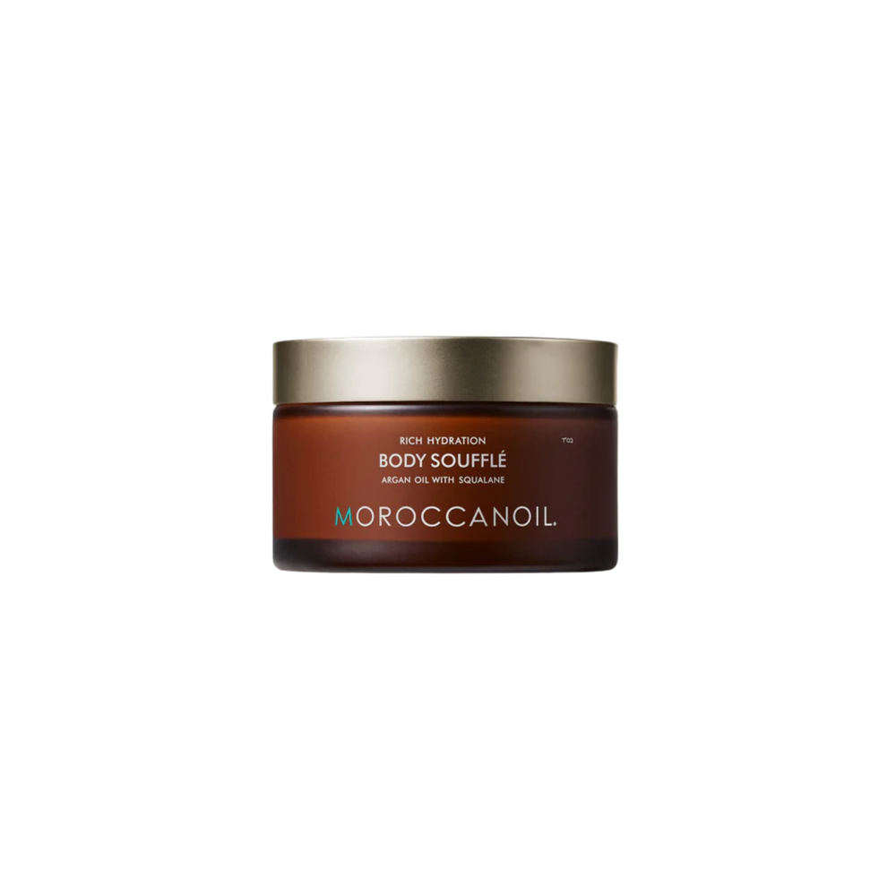 Pot de Soufflé Corps Moroccanoil : crème fouettée hydratante avec parfum signature, présenté dans un pot en verre recyclable.

