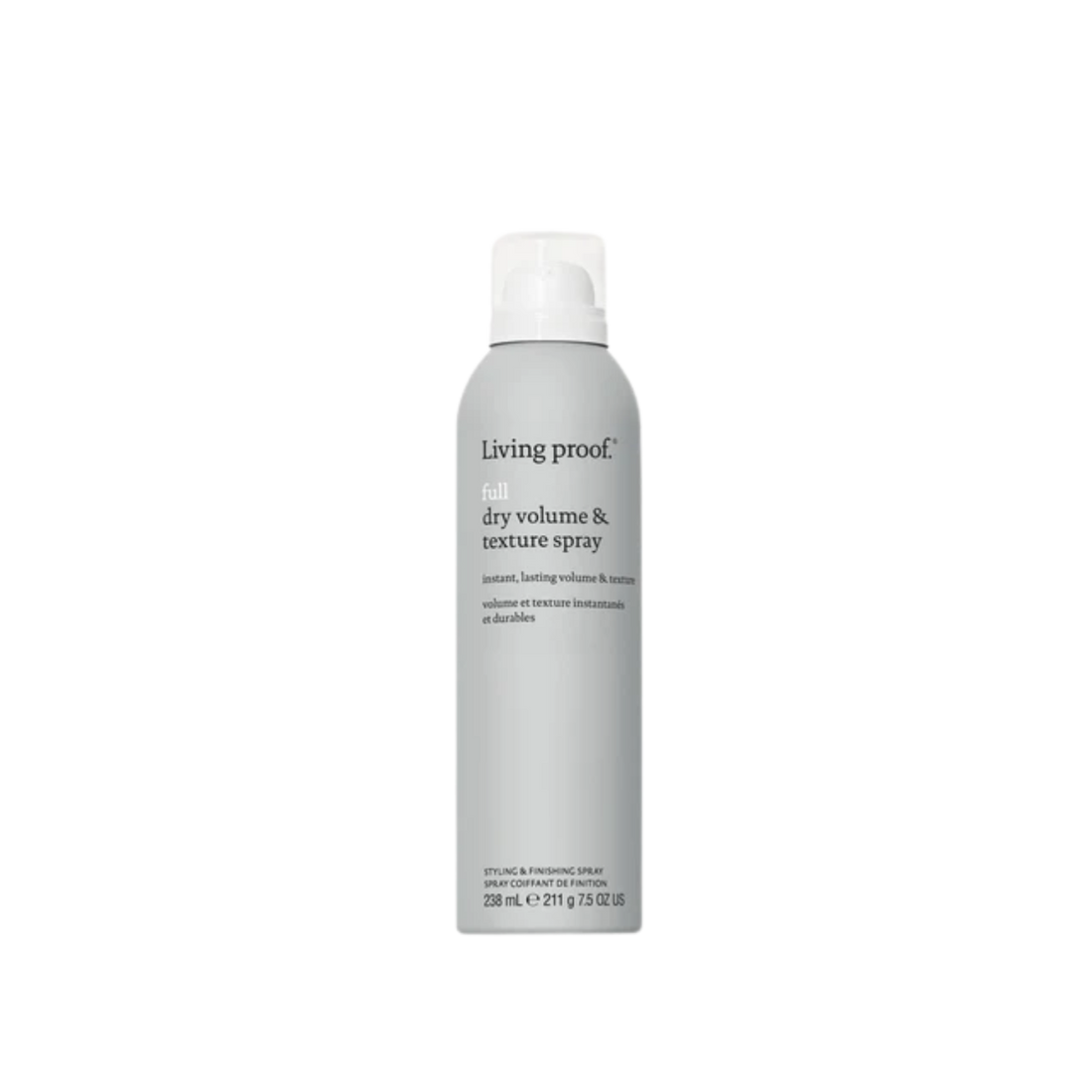 Flacon gris du Full Dry Volume & Texture Spray Living Proof posé sur fond neutre, évoquant volume immédiat, texture aérienne et finition légère.