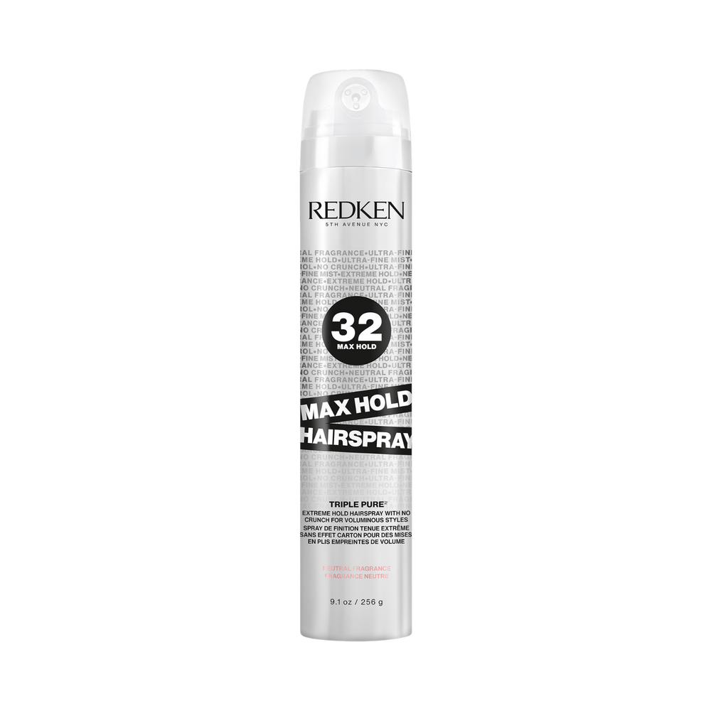 Flacon spray Triple Pure 32 Redken au parfum neutre, posé sur fond clair.