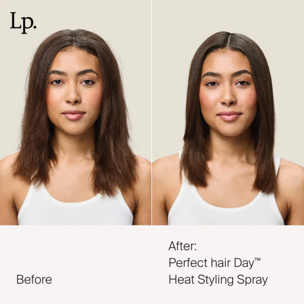 Flacon gris perle du spray Perfect Hair Day Heat Styling Spray de Living Proof, posé verticalement sur fond neutre, suggérant protection thermique et finition lisse.

