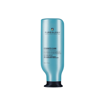 Flacon de Strength Cure Conditioner de Pureology sur fond neutre, avec bouchon visible.