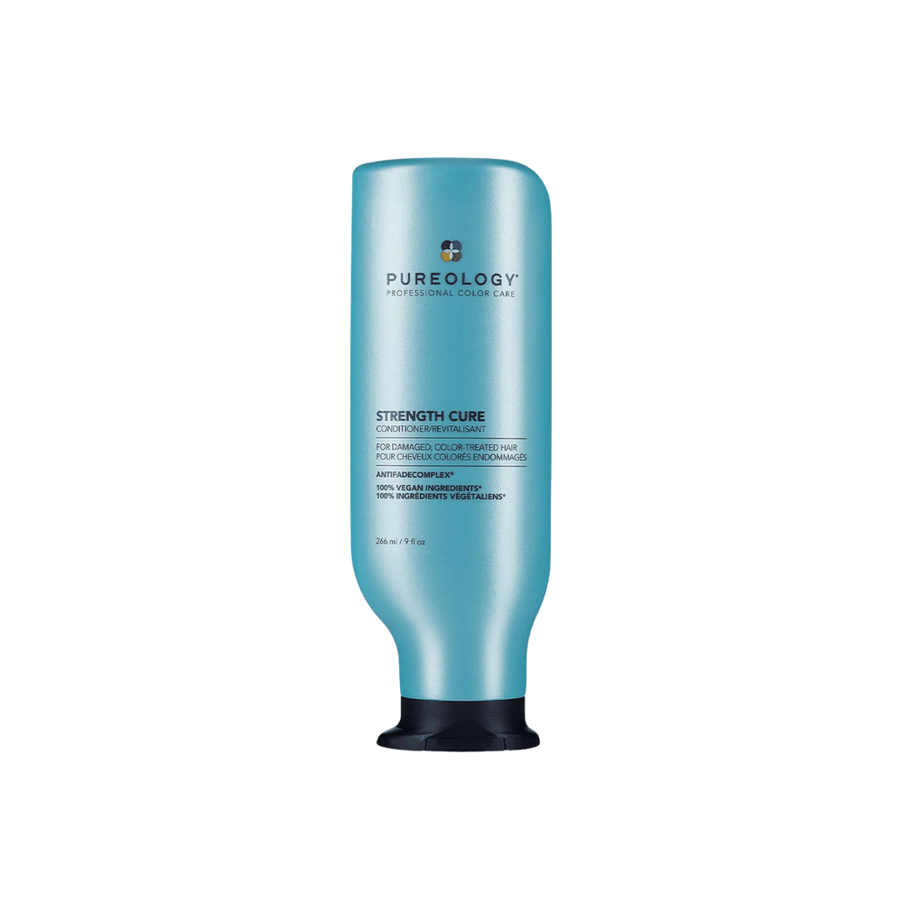 Flacon de Strength Cure Conditioner de Pureology sur fond neutre, avec bouchon visible.