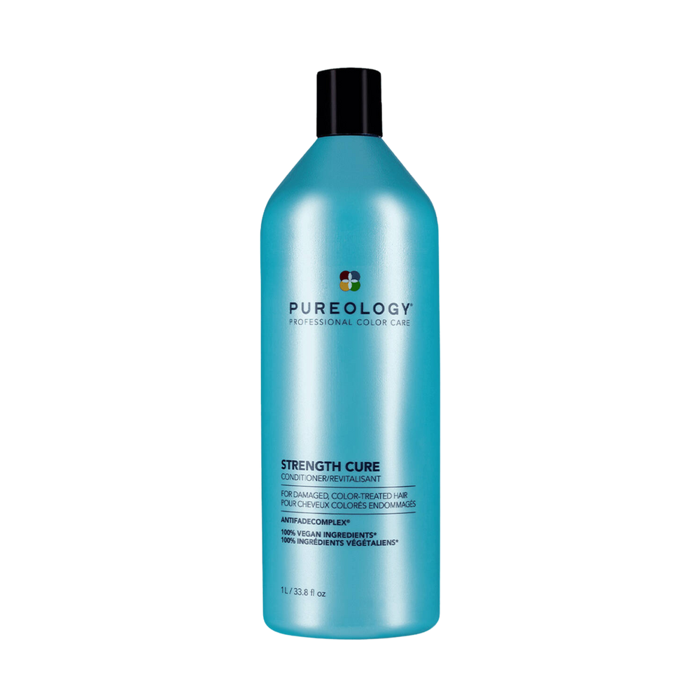 Flacon de Strength Cure Conditioner de Pureology sur fond neutre, avec bouchon visible.