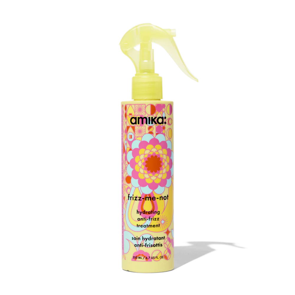 Flacon du soin amika Frizz Me Not pour cheveux hydratés et sans frisottis

